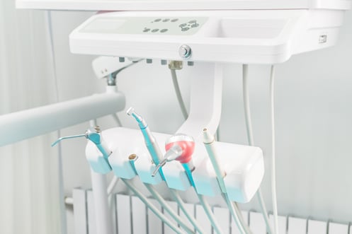 part-of-the-dental-chair-with-drill-air-and-other-devices